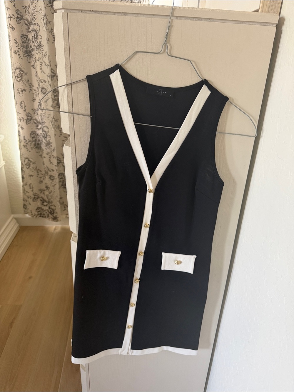 Black Sleeveless Mini Dress with White Trim and Gold Buttons